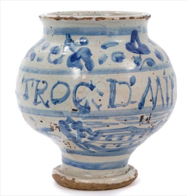 Lot 46 - 17th / 18th century Italian tin glazed drug jar, painted in underglaze blue with floral motifs