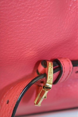 Lot 3112 - Michael Kors Pink leather back pack with engraved zipper pulls and circular logo lining.