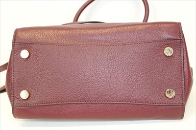 Lot 3114 - Michael Kors mulberry leather handbag with logo padlock to front. Engraved zipper pull and MK logo lining. Plus Michael Kors soft dust bag.