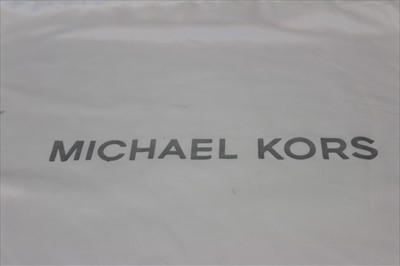 Lot 3114 - Michael Kors mulberry leather handbag with logo padlock to front. Engraved zipper pull and MK logo lining. Plus Michael Kors soft dust bag.