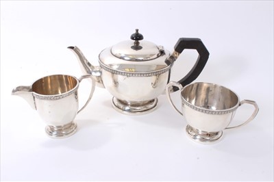 Lot 204 - 1940s silver three piece teaset