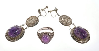 Lot 660 - Chinese white metal earrings and matching ring with carved amethysts