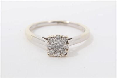 Lot 3295 - White gold 9ct diamond flower head cluster ring