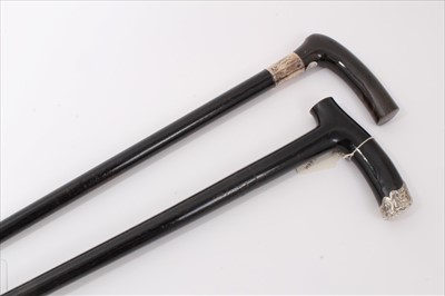 Lot 3674 - Victorian ebonised walking stick with engraved silver collar (marks rubbed) and Horn crutch handle together with one other similar with wooden crutch handle and silver end cap (Birmingham 1887), 88...