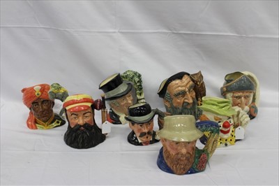 Lot 2167 - Eight Royal Doulton character jugs - The Elephant Trainer D6841, The Ringmaster D6863, W.G Grace D7032, Doc Holiday D6731, The Clown D6834, Merlin D6529, Don Quixote D6455 and Claude Monet D7150