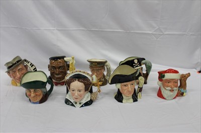 Lot 2173 - Eight Royal Doulton character jugs - Queen Mary I D7188, Toby Philpots D5736, Louis Armstrong D6707, Glen Miller D6970,  Long John Silver D6335, George Washington D6669, Jimmy Durante D6708 and San...