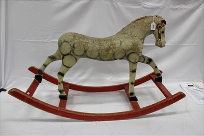Lot 2920 - Old carved and painted wood Rocking Horse, straw filled hessian body and clear glass eyes.