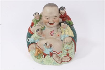 Lot 42 - 20th century Chinese porcelain figure of Buddha, with five boys playing around him, impressed mark to base, 26cm height