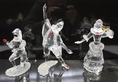 Lot 851 - Three Swarovski crystal Masquerade figures