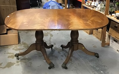 Lot 1085 - Regency style mahogany twin pedestal dining table