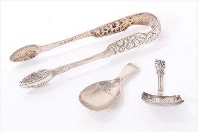 Lot 228 - Pair of Georgian Irish silver sugar tongs and two silver caddy spoons