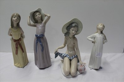Lot 193 - Four Lladro figures, between 20cm and 26cm height