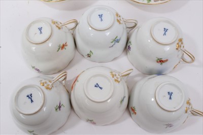 Lot 152 - Set of six 19th century Meissen floral painted cups and five saucers