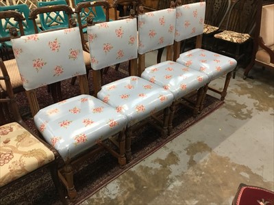 Lot 1062 - Set of four dining chairs with lion finials
