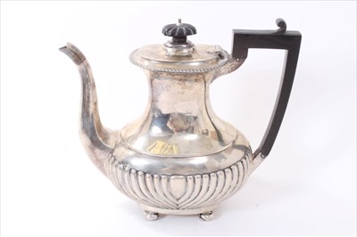 Lot 253 - Edwardian silver coffee pot.