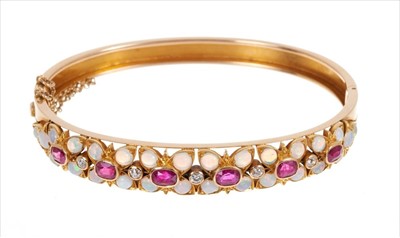 Lot 365 - Late Victorian opal, ruby and diamond hinged bangle