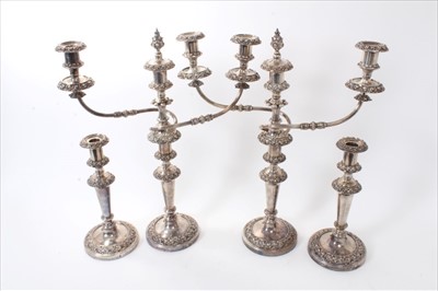 Lot 261 - Pair of 19th century silver plated candelabra and a pair of matching candlesticks.