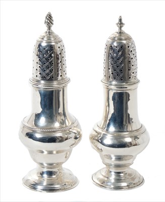 Lot 286 - Two 18th century silver castors