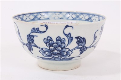 Lot 130 - Bow blue and white tea bowl, painted with flowers, circa 1760