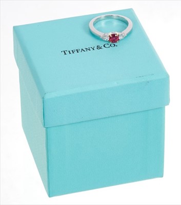 Lot 368 - Tiffany & Co. ruby and diamond three stone ring - boxed