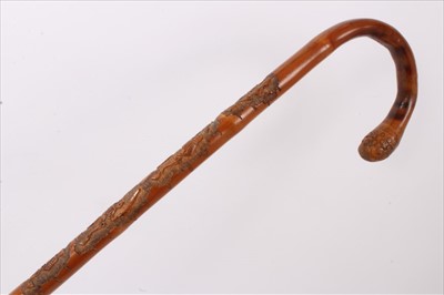 Lot 721 - Unusual macabre late 19th / early 20th century Japanese carved bamboo walking stick, with crook handle with root terminal and relief carved with skeletons, signed, 91cm long