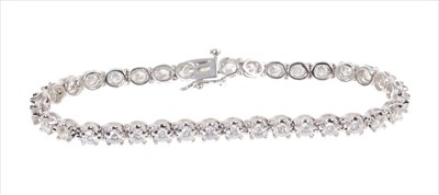 Lot 380 - 18ct white gold diamond tennis bracelet, approximately 4.32cts