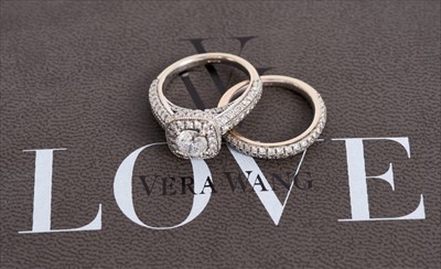 Lot 382 - Vera Wang Love Collection 18ct white gold diamond Halo ring, together with a matching wedding ring
