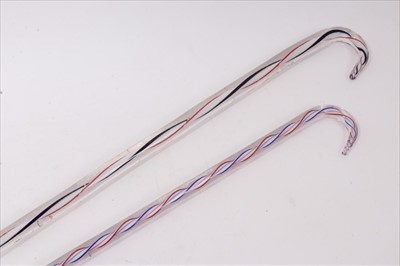 Lot 753 - Antique glass candy cane walking stick, with crook handle, 95cm long, together with a similar smaller stick