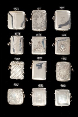 Lot 304 - Collection of twelve Edwardian and later silver vesta cases including military interest (12)