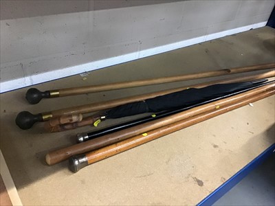 Lot 95 - Group of walking sticks and staffs