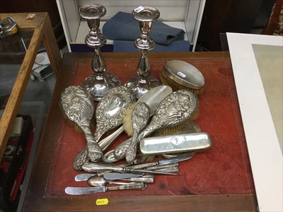 Lot 690 - Various silver backed dressing table items, silver handled tea knives and a pair of silver plated candlesticks