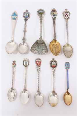 Lot 40 - Ten silver/white metal and enamel souvenir spoons