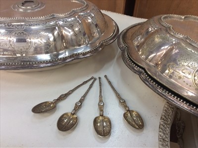 Lot 658 - Four silver anointing spoons, together with two silver plated entree dishes