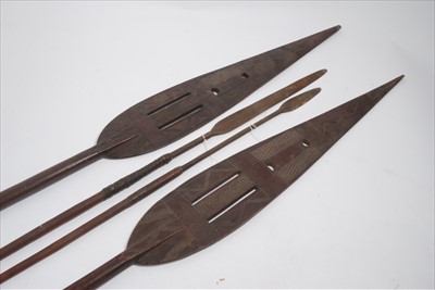 Lot 780 - Two Antique African Tribal spears, together with two African carved wood staffs (4)