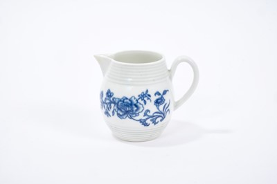 Lot 24 - Worcester barrel shaped jug, circa 1760-65, painted with floral sprays, crescent mark to base, 6.5cm height