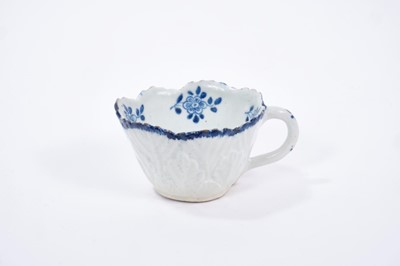 Lot 29 - Bow blue and white butter boat, circa 1765, painted with floral sprays, 8.5cm length