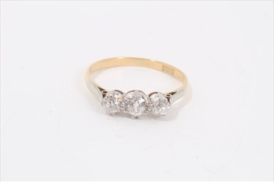 Lot 115 - Ladies 18ct gold and diamond three stone ring