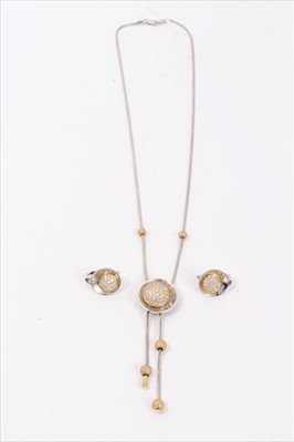 Lot 117 - White gold cubic zirconia necklace and earring set