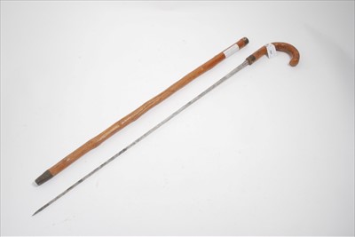 Lot 791 - Late 19th Century sword stick, by Mole, Birmingham, blade approx. 75cm in length together with two walking sticks (3)