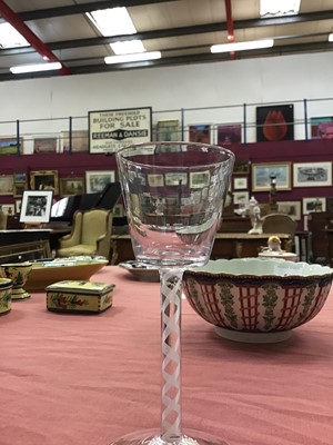 Lot 12 - Near set of four Georgian-style wine glasses, possibly continental, with bucket bowls and opaque twist stems