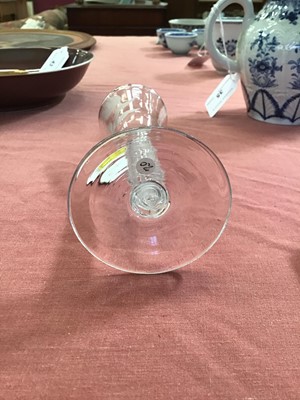 Lot 5 - Georgian wine glass, the round funnel bowl engraved with a flower, on a double series opaque twist stem, above a conical foot, circa 1760, 15cm height