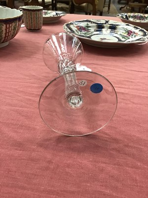 Lot 14 - 18th century wine glass with multi-spiral airtwist stem, together with an 18th century opaque twist glass with ogee bowl (2)