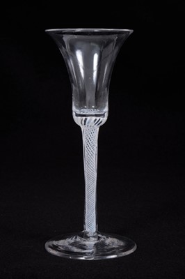 Lot 18 - Georgian wine glass, with a bell-shaped bowl on a single series spiral gauze opaque twist stem, above a conical foot, circa 1760, 18cm height