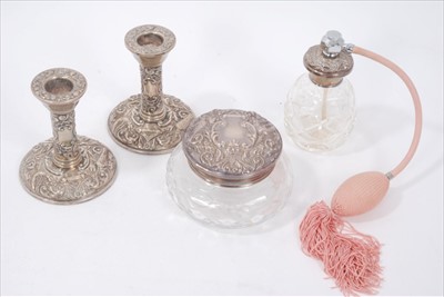 Lot 178 - Pair silver candlesticks, silver topped glass jar and atomiser, all with bird and scroll decoration