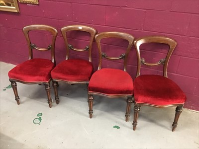 Lot 856 - Set of four Victorian mahogany hoop back dining chairs with red velvet upholstered seats, on turned and fluted legs