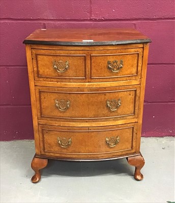 Lot 858 - Georgian style bowfront bedside chest of three drawers on cabriole legs
