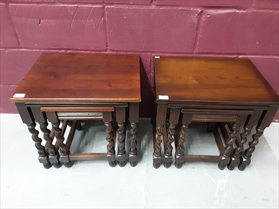 Lot 860 - Two oak nest of three tables with barley twist legs and matching coffee table