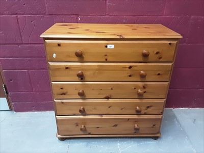 Lot 867 - Modern pine chest of five long drawers and a pine blanket box