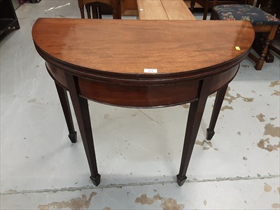 Lot 874 - George III mahogany demi-lune tea table