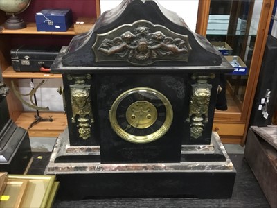 Lot 138 - Late Victorian black slate mantel clock of large proportions, architectural form, with applied gilt metal mounts and circular dial with exposed anchor escapement (keys and pendulum present), 51cm h...